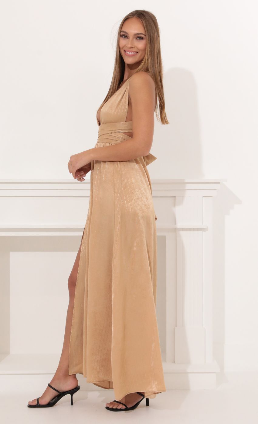 Picture Samara Satin Maxi Dress in Gold Pinstripe. Source: https://media-img.lucyinthesky.com/data/Jan22_1/850xAUTO/1V9A0681.JPG