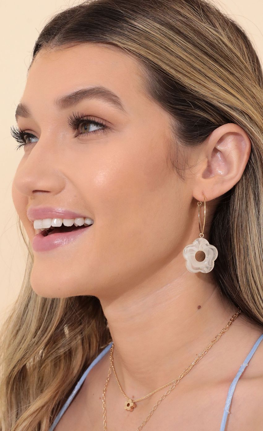Picture Sweet Like Daisy Earring in Gold. Source: https://media-img.lucyinthesky.com/data/Jan22_1/850xAUTO/1V9A1087.JPG
