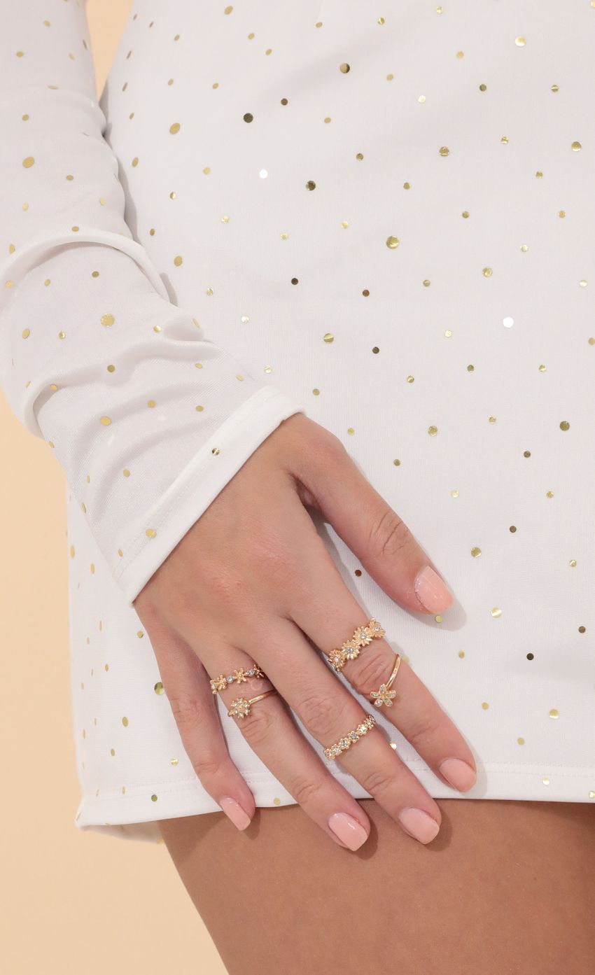 Picture Sweet Pea Ring Set in Gold. Source: https://media-img.lucyinthesky.com/data/Jan22_1/850xAUTO/1V9A4478.JPG