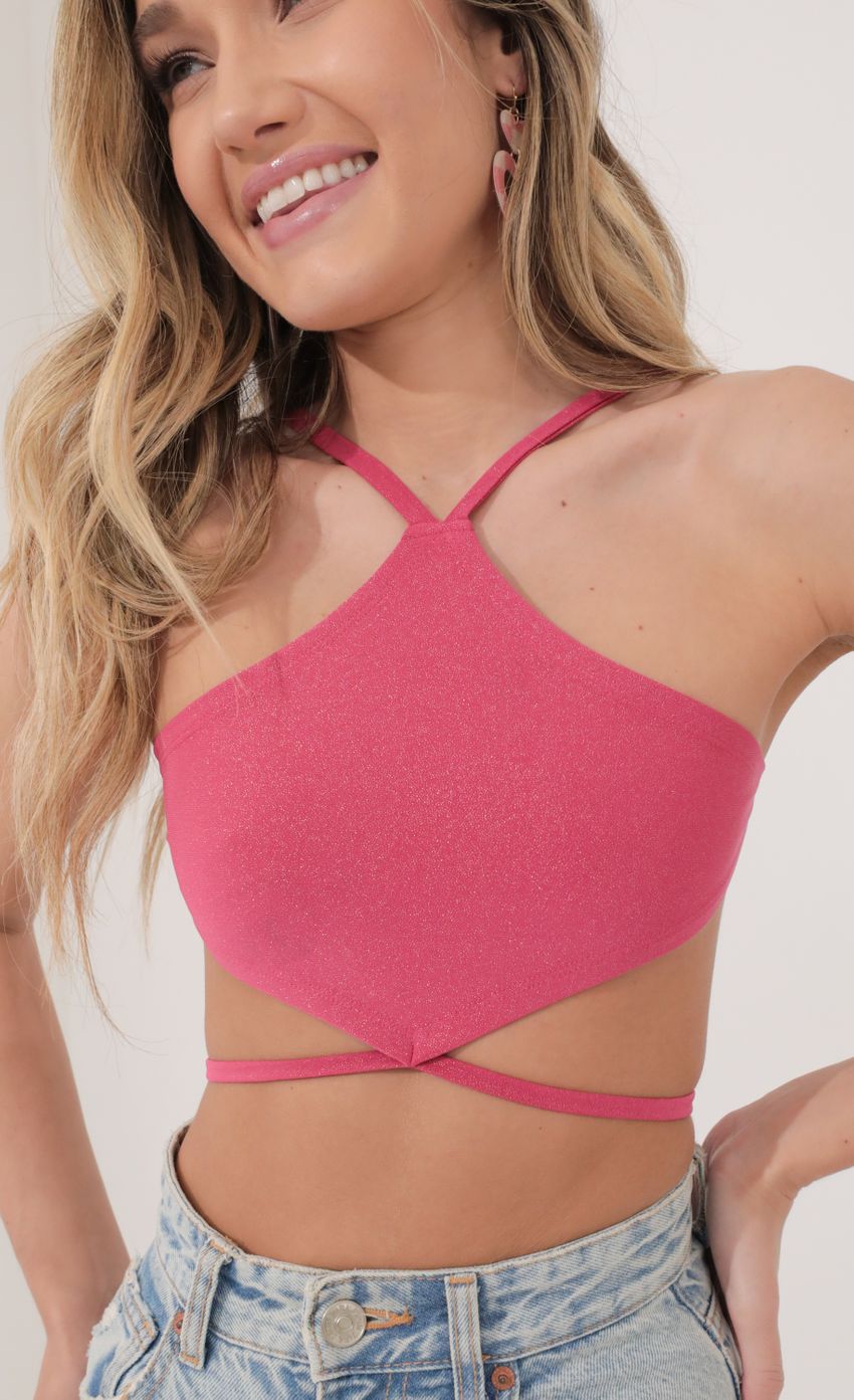 Picture Halter Crop Top in Pink Shimmer. Source: https://media-img.lucyinthesky.com/data/Jan22_2/850xAUTO/1J7A3848-2.JPG