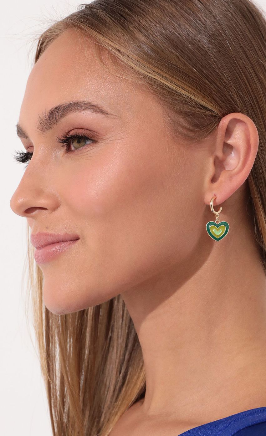 Picture She's A Saint Earring Set in Green. Source: https://media-img.lucyinthesky.com/data/Jan22_2/850xAUTO/1V9A18181.JPG