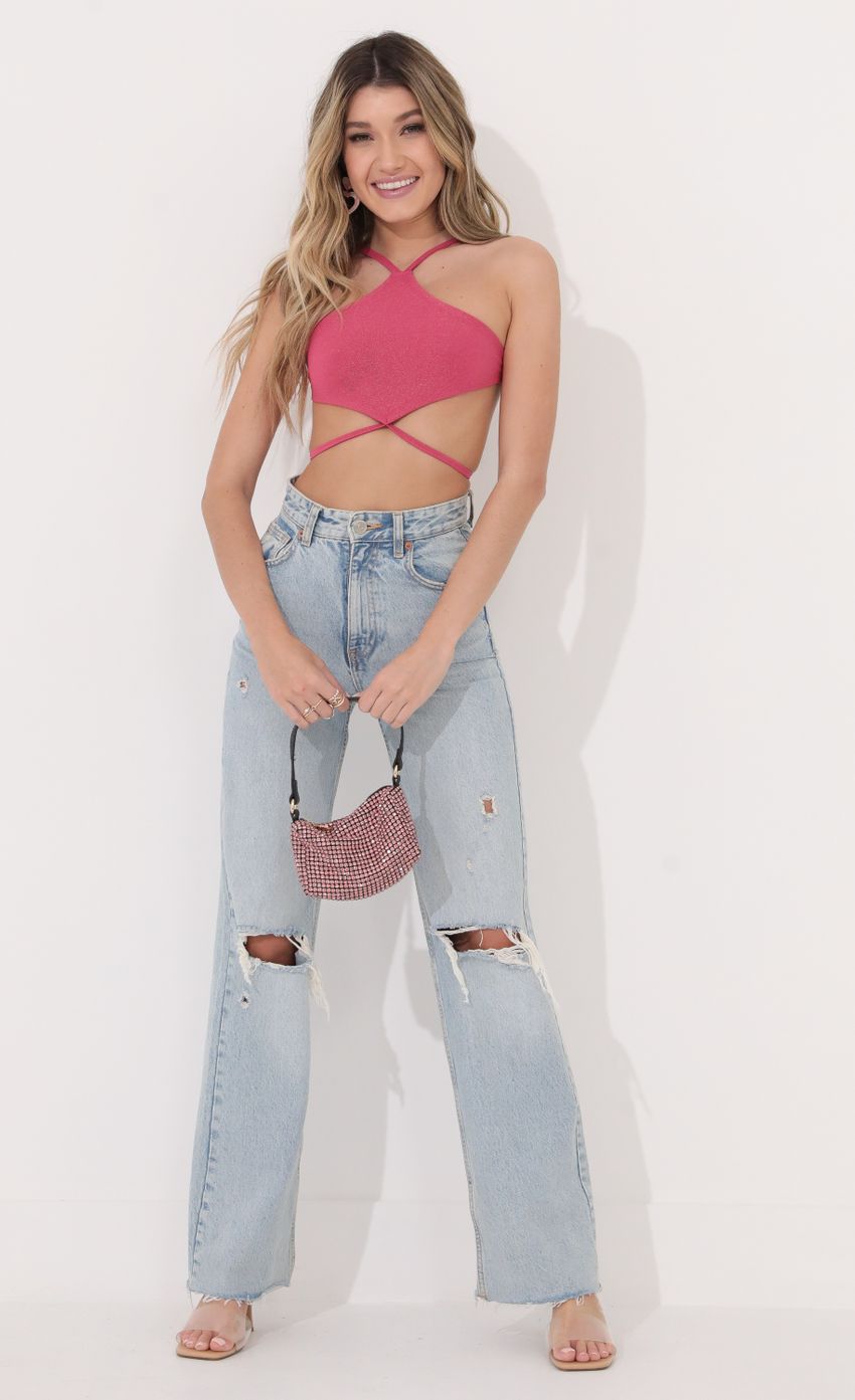Picture Halter Crop Top in Pink Shimmer. Source: https://media-img.lucyinthesky.com/data/Jan22_2/850xAUTO/1V9A5570.JPG