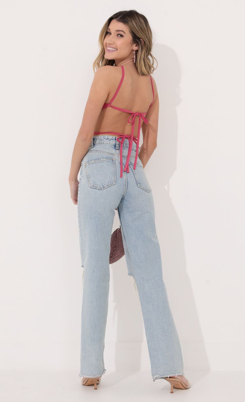 Picture Halter Crop Top in Pink Shimmer. Source: https://media-img.lucyinthesky.com/data/Jan22_2/850xAUTO/1V9A5758.JPG