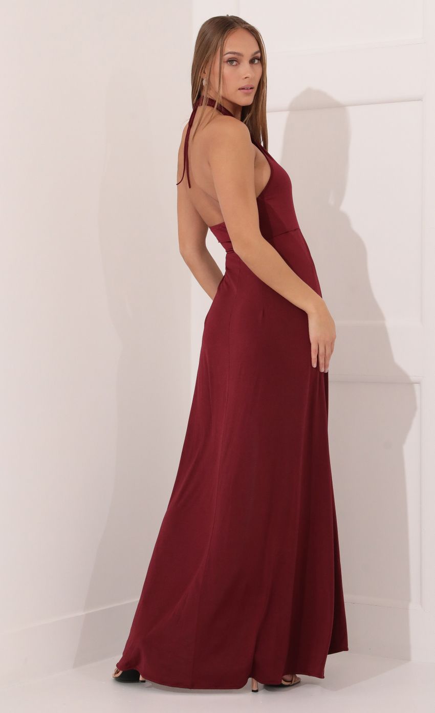 Picture Halter Maxi Dress in Burgundy. Source: https://media-img.lucyinthesky.com/data/Jan22_2/850xAUTO/1V9A6287.JPG