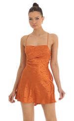 Picture Swirl A-Line Mini Dress in Orange. Source: https://media-img.lucyinthesky.com/data/Jan23/150xAUTO/3114e112-db43-4245-8f95-9e876d654a2a.jpg