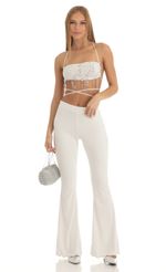 Picture Sequin Two Piece Pant Set in White. Source: https://media-img.lucyinthesky.com/data/Jan23/150xAUTO/b22cf944-ed28-4729-8f9f-952e731b244a.jpg