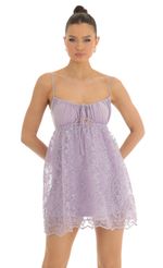 Picture Sequin Embroidered Baby Doll Dress in Purple. Source: https://media-img.lucyinthesky.com/data/Jan23/150xAUTO/cce4d5a0-2f7f-4bda-bdbc-f2f7e7c35bee.jpg