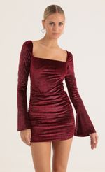 Picture Glitter Velvet Bell Sleeve Dress in Red. Source: https://media-img.lucyinthesky.com/data/Jan23/150xAUTO/cee52165-ab9e-4f28-a7a7-dc3c8f6a7d3c.jpg
