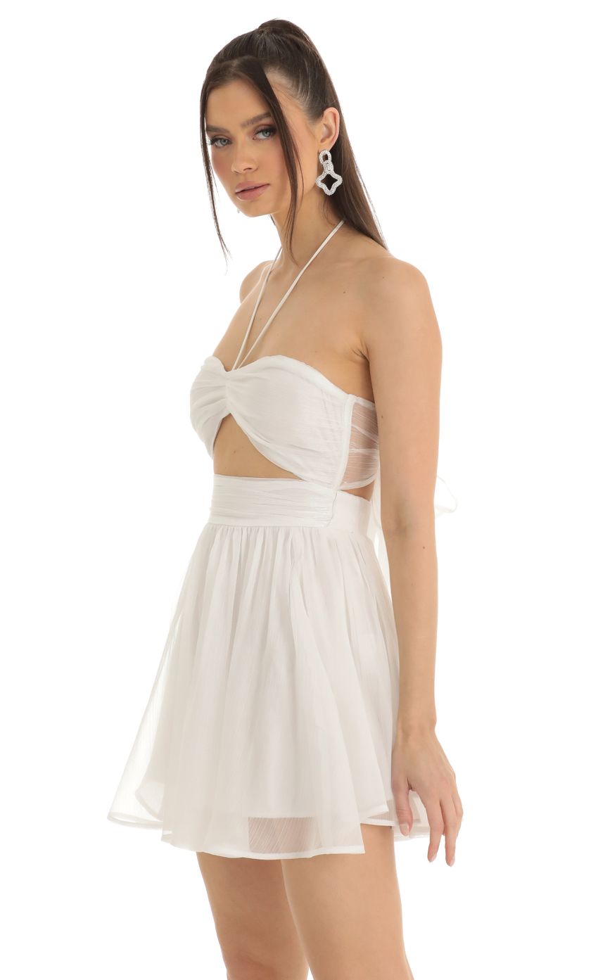 Picture Halter Cutout Dress in White. Source: https://media-img.lucyinthesky.com/data/Jan23/850xAUTO/0603b370-85c2-48fe-9e83-0d195f4cb3dd.jpg