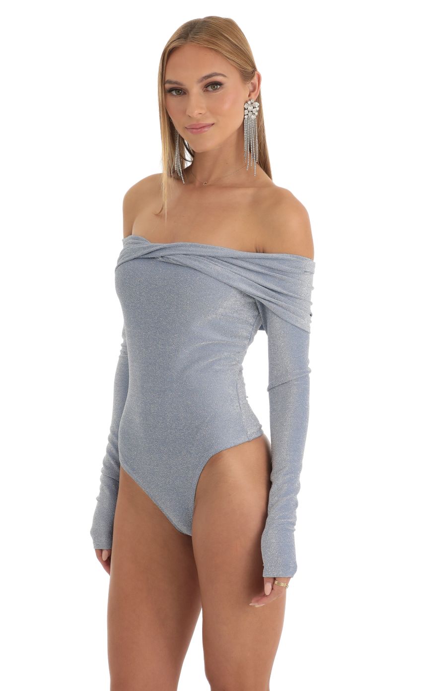 Picture Metallic Bodysuit in Stone Blue. Source: https://media-img.lucyinthesky.com/data/Jan23/850xAUTO/07d59d84-9539-4f08-a20d-5334a10f7147.jpg