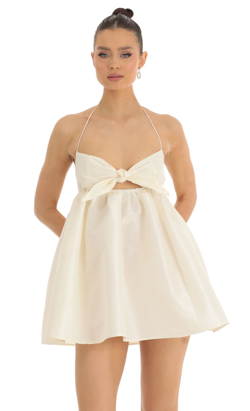 Picture Front Tie Baby Doll Dress in Cream. Source: https://media-img.lucyinthesky.com/data/Jan23/850xAUTO/1a63aab9-0047-4ea5-988d-9fa39c31cf12.jpg