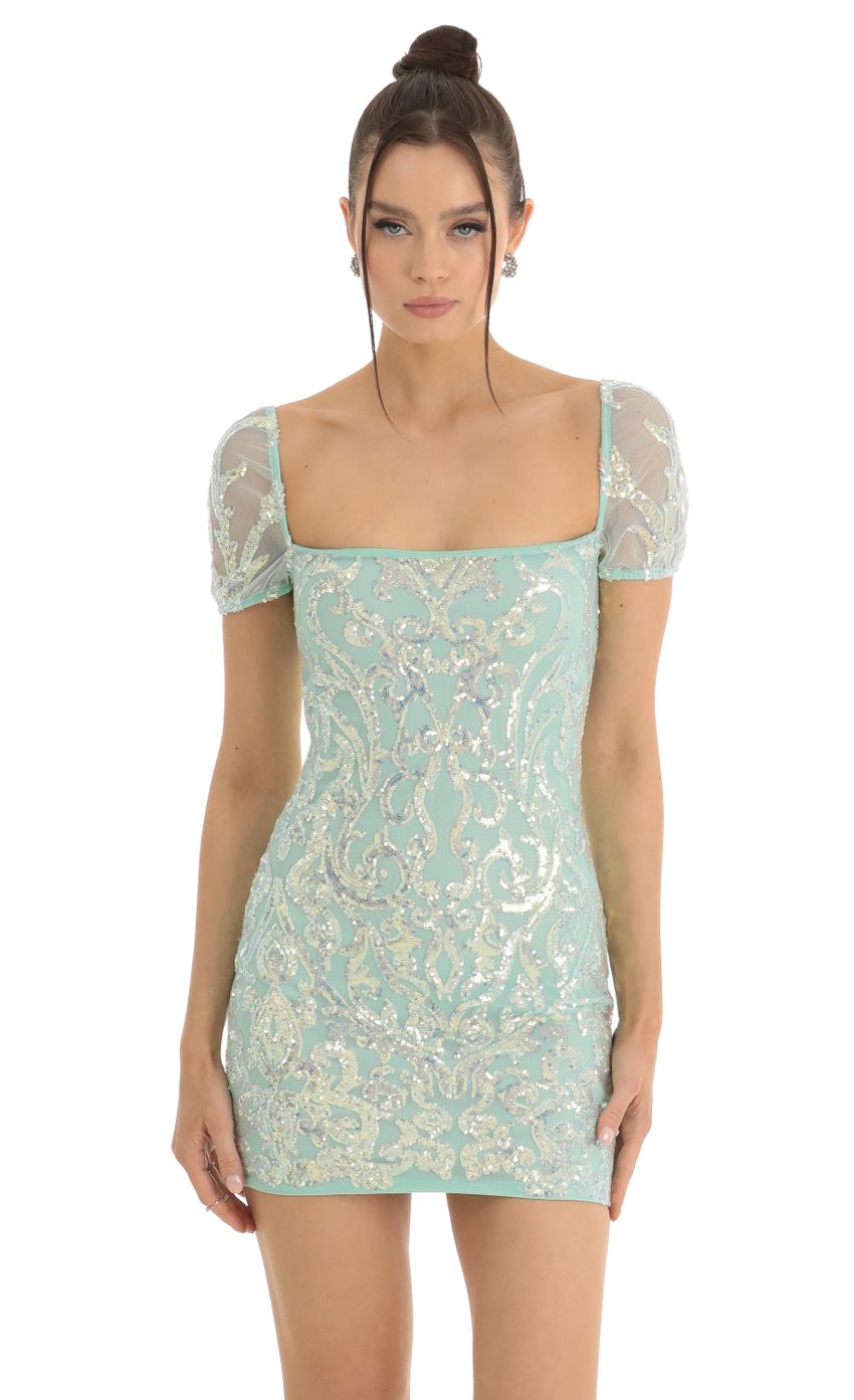 Picture Glitter Short Sleeve Bodycon Dress in Teal. Source: https://media-img.lucyinthesky.com/data/Jan23/850xAUTO/1c94ed57-1006-432a-912d-5412b04d0112.jpg