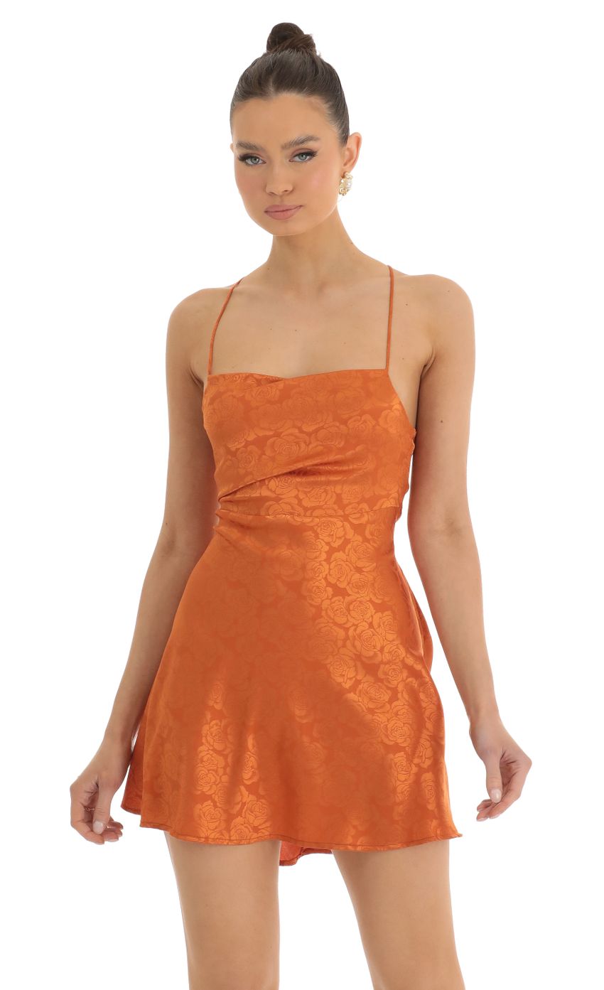 Picture Floral Jacquard A-Line Dress in Orange. Source: https://media-img.lucyinthesky.com/data/Jan23/850xAUTO/3114e112-db43-4245-8f95-9e876d654a2a.jpg