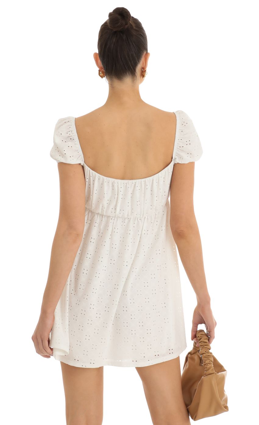 Picture Baby Doll Dress in White. Source: https://media-img.lucyinthesky.com/data/Jan23/850xAUTO/36058969-2441-48fc-b6e1-2b09940a10e3.jpg
