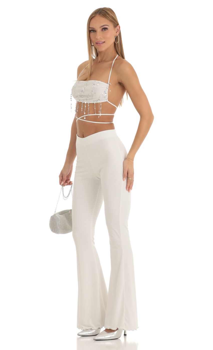 Picture Sequin Two Piece Pant Set in White. Source: https://media-img.lucyinthesky.com/data/Jan23/850xAUTO/370c57ae-5f9a-42bc-816d-02b821714444.jpg