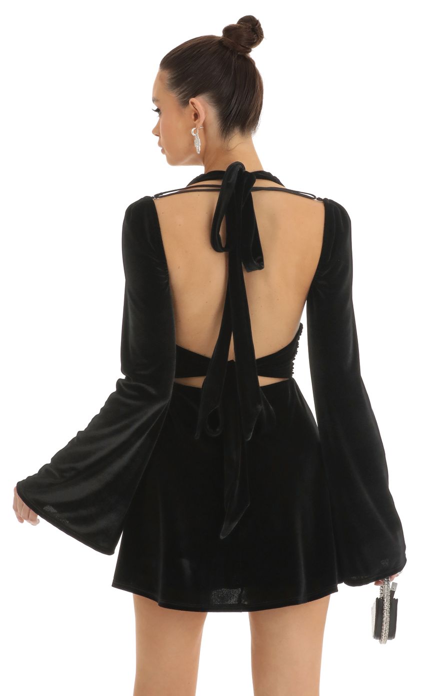 Picture Velvet Cold Shoulder Plunge Dress in Black. Source: https://media-img.lucyinthesky.com/data/Jan23/850xAUTO/404fe0e0-1c24-41d8-a91e-996bdb586c08.jpg