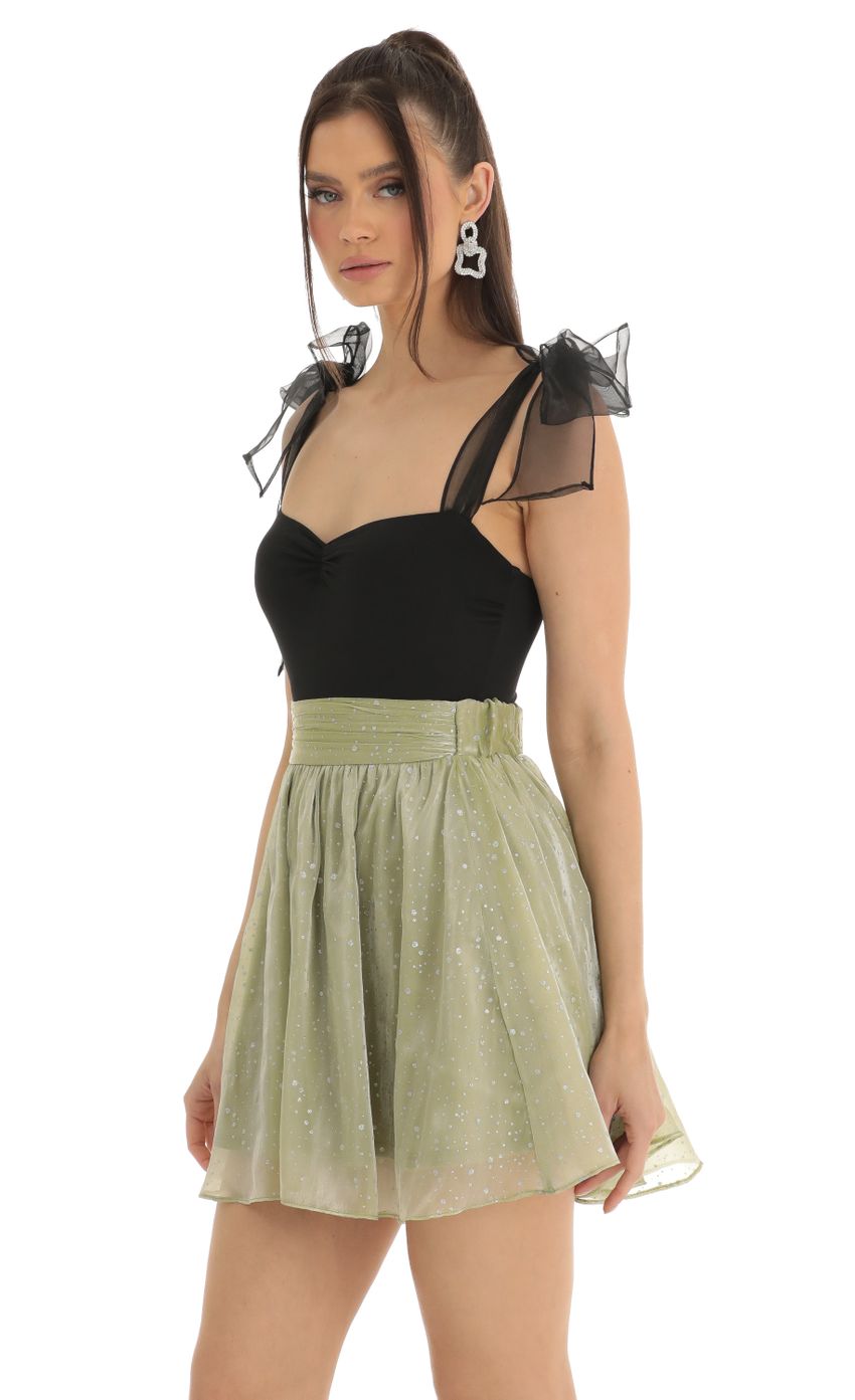 Picture Glitter Skater Skirt in Green. Source: https://media-img.lucyinthesky.com/data/Jan23/850xAUTO/46a04441-25ff-483b-99ee-5754ac1921e4.jpg