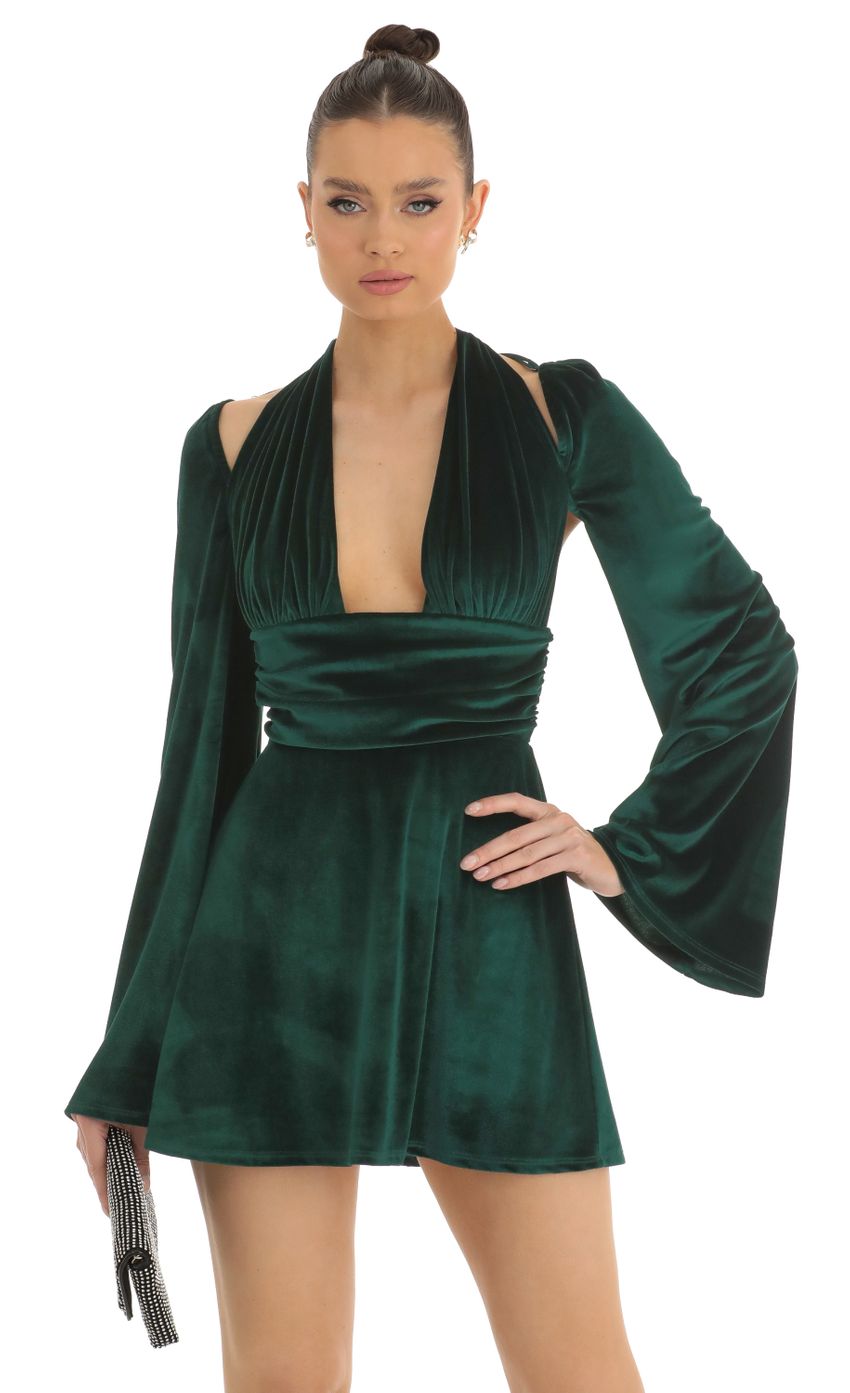 Picture Velvet Cold Shoulder Plunge Dress in Dark Green. Source: https://media-img.lucyinthesky.com/data/Jan23/850xAUTO/50e77d1e-f54f-4c28-ad0c-f647301489ef.jpg
