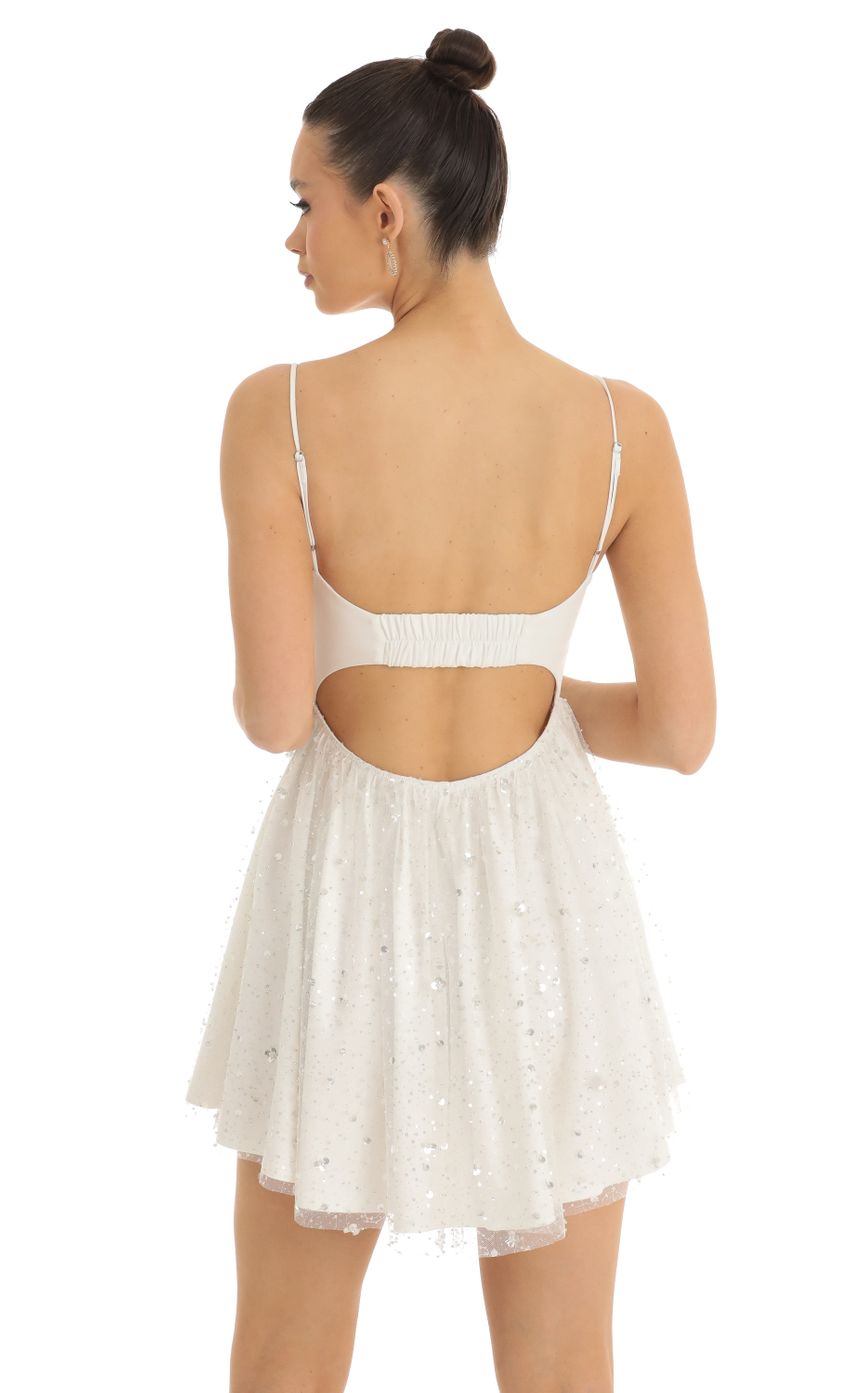 Picture Sequin Suede Bustier Dress in White. Source: https://media-img.lucyinthesky.com/data/Jan23/850xAUTO/64fdd0fa-a00d-42ed-b451-3292ae342845.jpg
