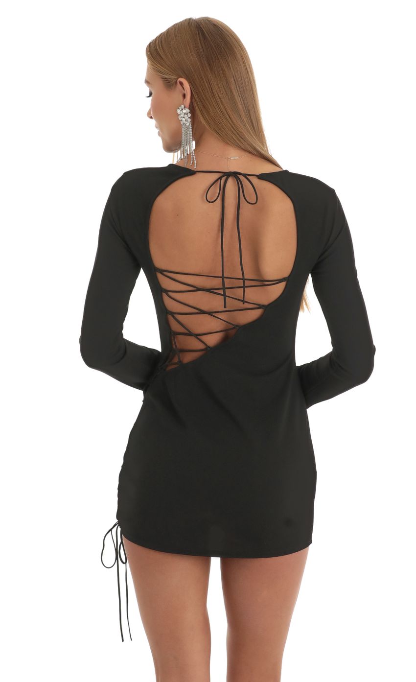 Picture Long Sleeve Lace Up Dress in Black. Source: https://media-img.lucyinthesky.com/data/Jan23/850xAUTO/672cdb4c-ff3b-47a5-be45-4ff2bebfc06a.jpg