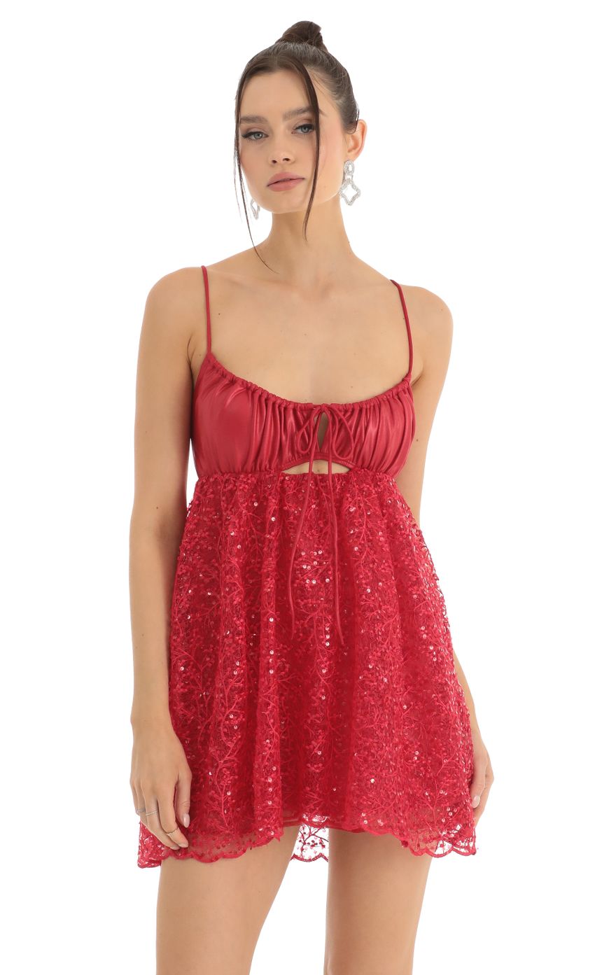 Picture Sequin Embroidered Baby Doll Dress in Red. Source: https://media-img.lucyinthesky.com/data/Jan23/850xAUTO/6951776a-6ea8-4e6b-a6d7-fd79206ed13c.jpg