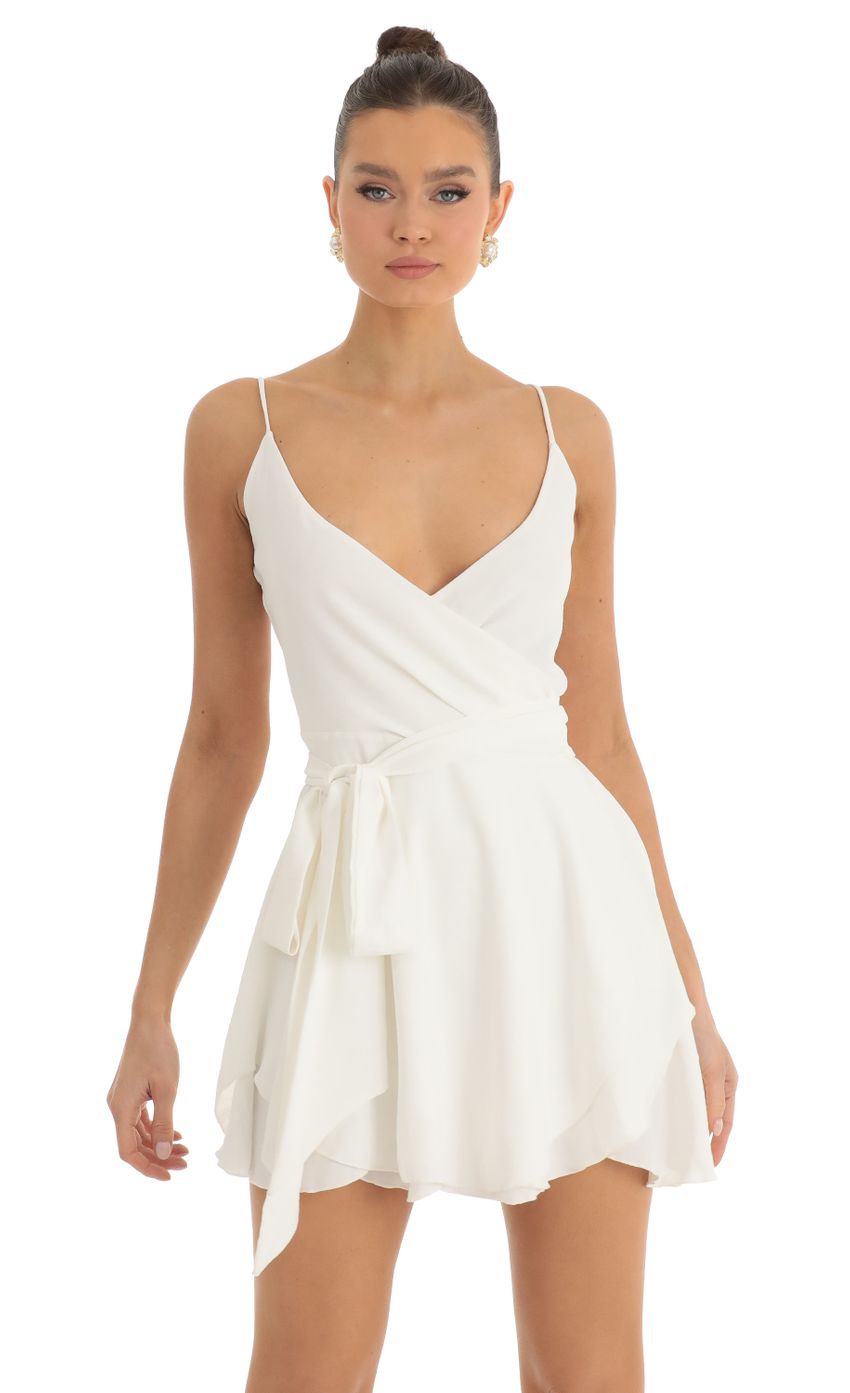 Picture Wrap Skater Dress in Ivory. Source: https://media-img.lucyinthesky.com/data/Jan23/850xAUTO/6c548ff4-edee-4619-b8f1-96c0a291c997.jpg