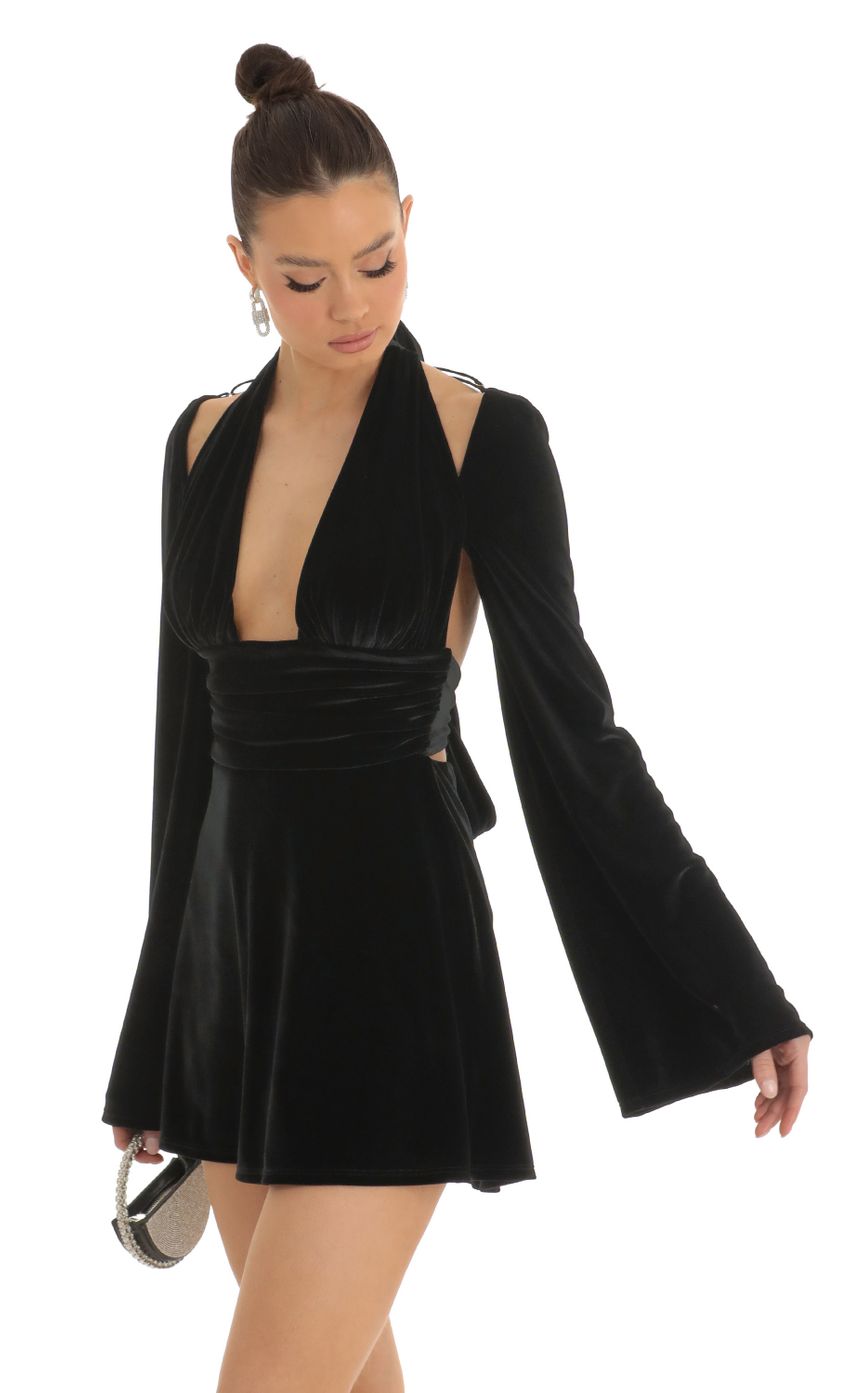 Picture Velvet Cold Shoulder Plunge Dress in Black. Source: https://media-img.lucyinthesky.com/data/Jan23/850xAUTO/7125360b-31f4-4e52-9eca-56ef58848a1d.jpg