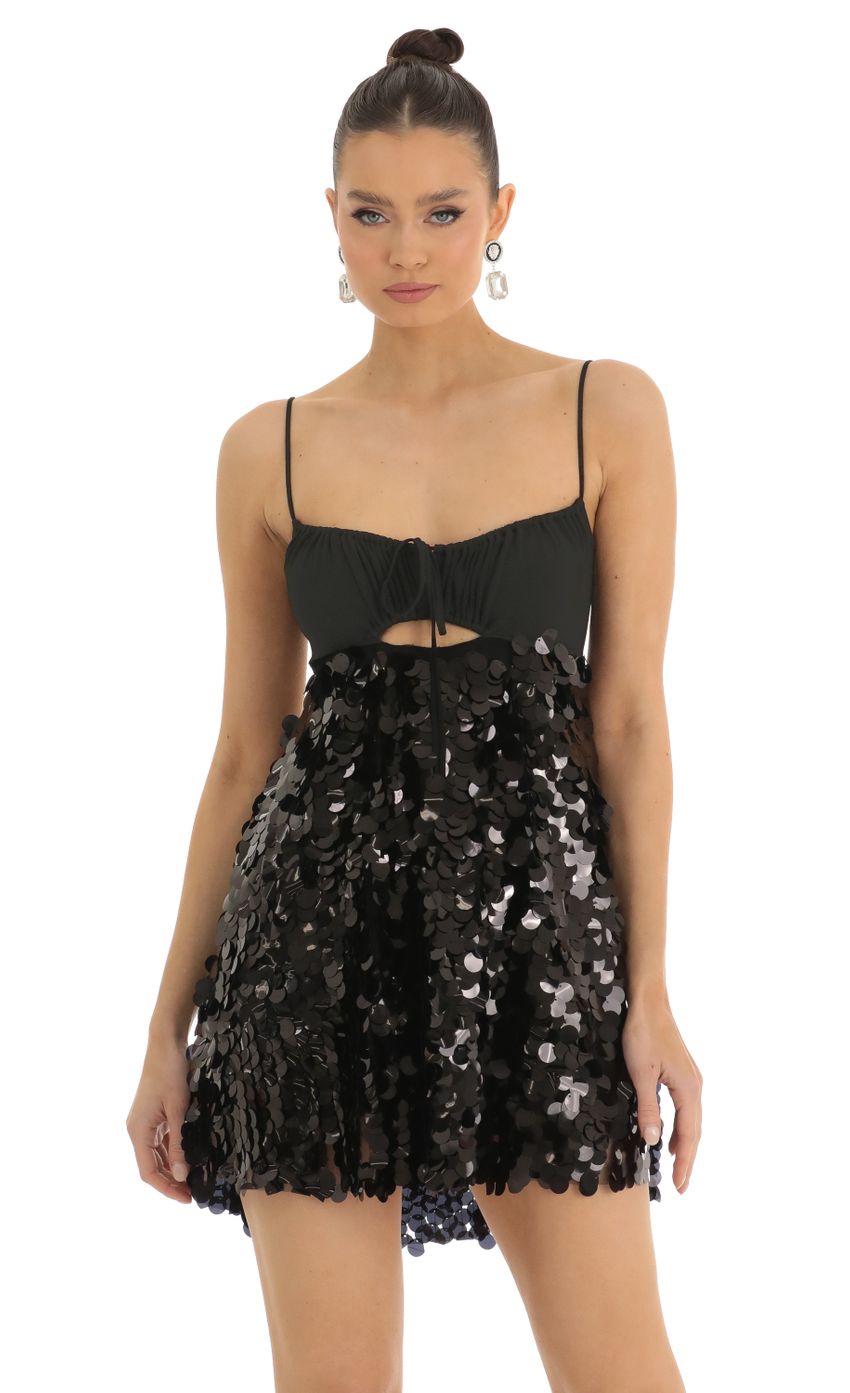 Picture Big Sequin Keyhole Baby Doll Dress is Black. Source: https://media-img.lucyinthesky.com/data/Jan23/850xAUTO/7bb1dece-f185-486e-ac5a-c301f433c1ae.jpg