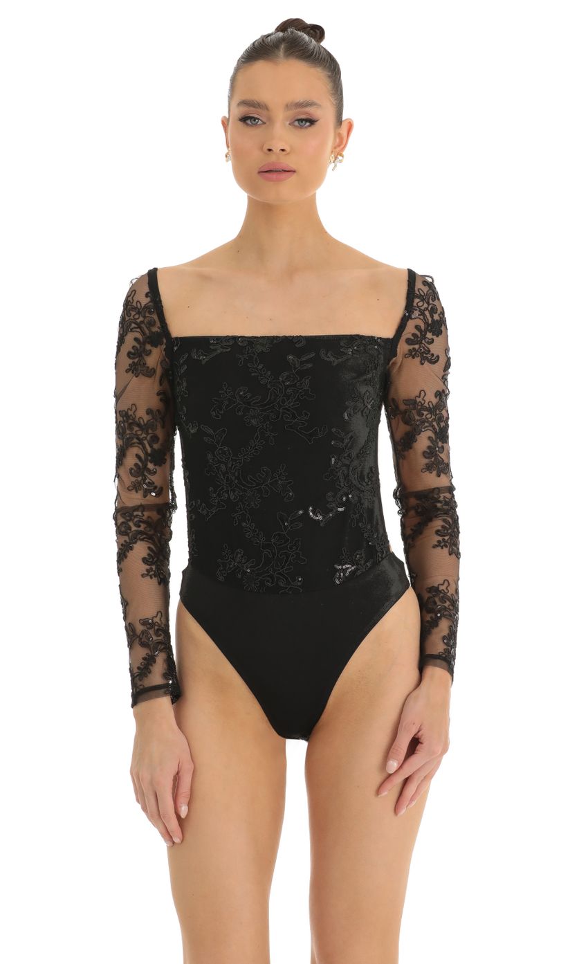 Picture Sarahi Floral Sequin Bodysuit in Black. Source: https://media-img.lucyinthesky.com/data/Jan23/850xAUTO/83386ede-694b-4ad9-98fd-9e66f36ad264.jpg