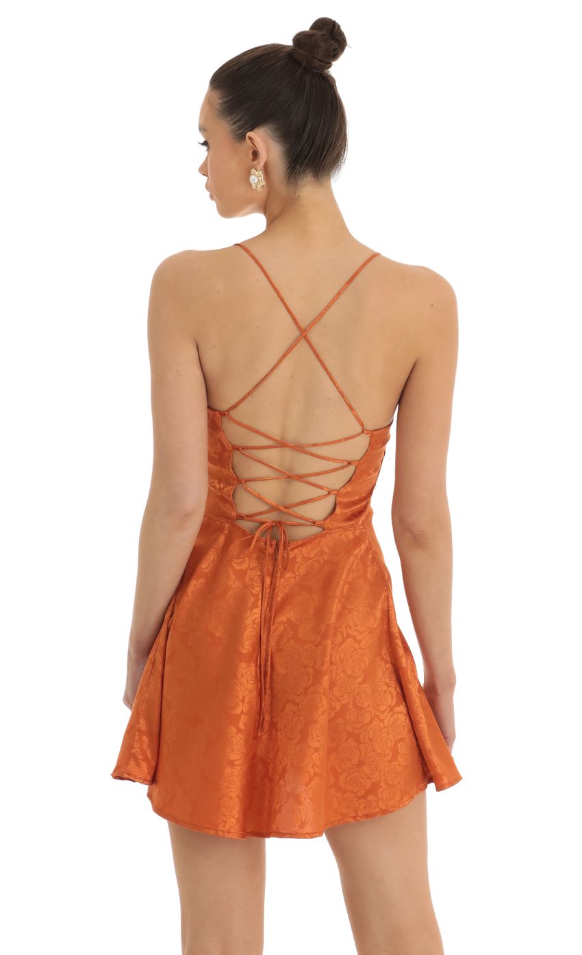 Picture Floral Jacquard A-Line Dress in Orange. Source: https://media-img.lucyinthesky.com/data/Jan23/850xAUTO/8919c019-925e-4400-aade-0c0bee178b0b.jpg
