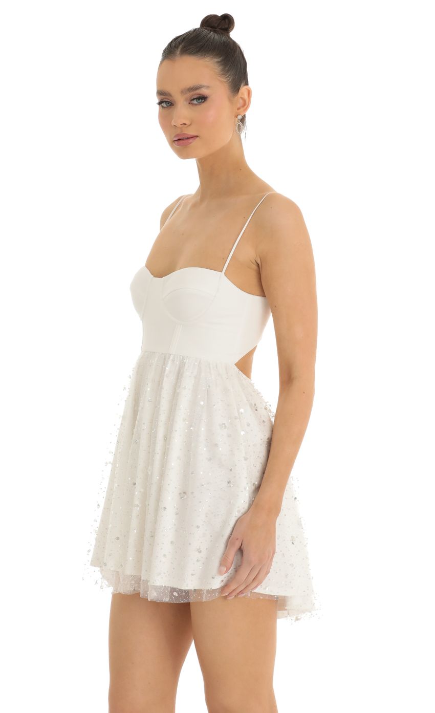 Picture Sequin Suede Bustier Dress in White. Source: https://media-img.lucyinthesky.com/data/Jan23/850xAUTO/8b098c45-26b2-4eaa-8def-3cd47d7baba3.jpg