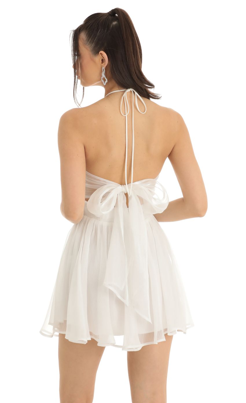 Picture Halter Cutout Dress in White. Source: https://media-img.lucyinthesky.com/data/Jan23/850xAUTO/90111566-1428-4fc6-b599-b889702d1182.jpg