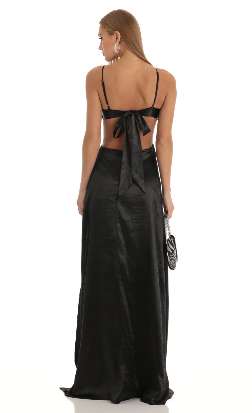 Picture Satin Cutout Maxi Dress in Black. Source: https://media-img.lucyinthesky.com/data/Jan23/850xAUTO/9b57fe7d-df12-45a0-84d5-d59c50a10987.jpg