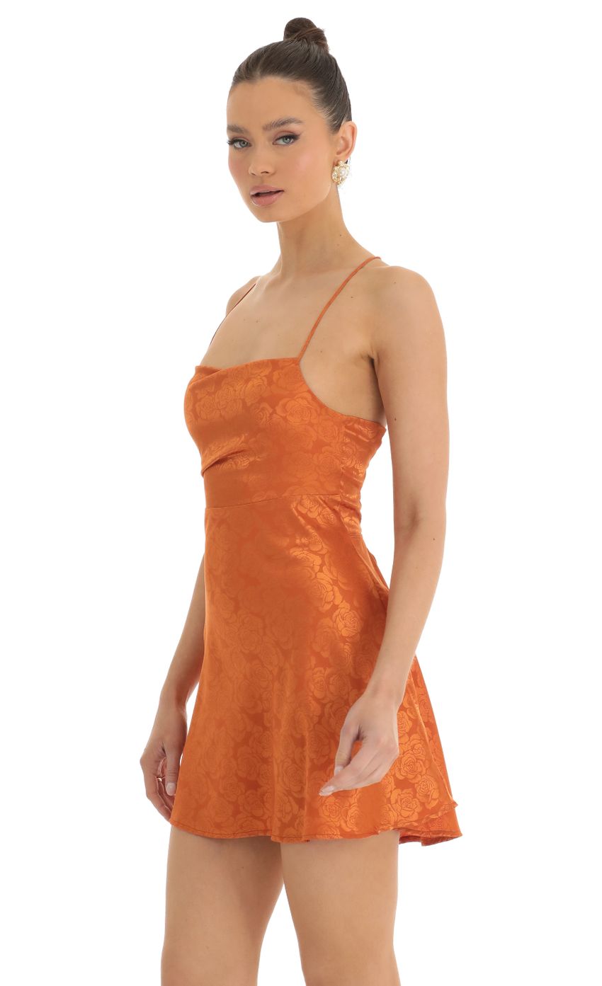 Picture Floral Jacquard A-Line Dress in Orange. Source: https://media-img.lucyinthesky.com/data/Jan23/850xAUTO/a0faee35-2bdb-4623-b36d-2be994a48aae.jpg