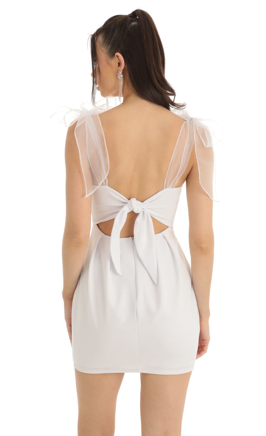 Picture Bow Mini Dress in White. Source: https://media-img.lucyinthesky.com/data/Jan23/850xAUTO/a1e3d608-7bf5-42d4-b322-e77c7727008a.jpg
