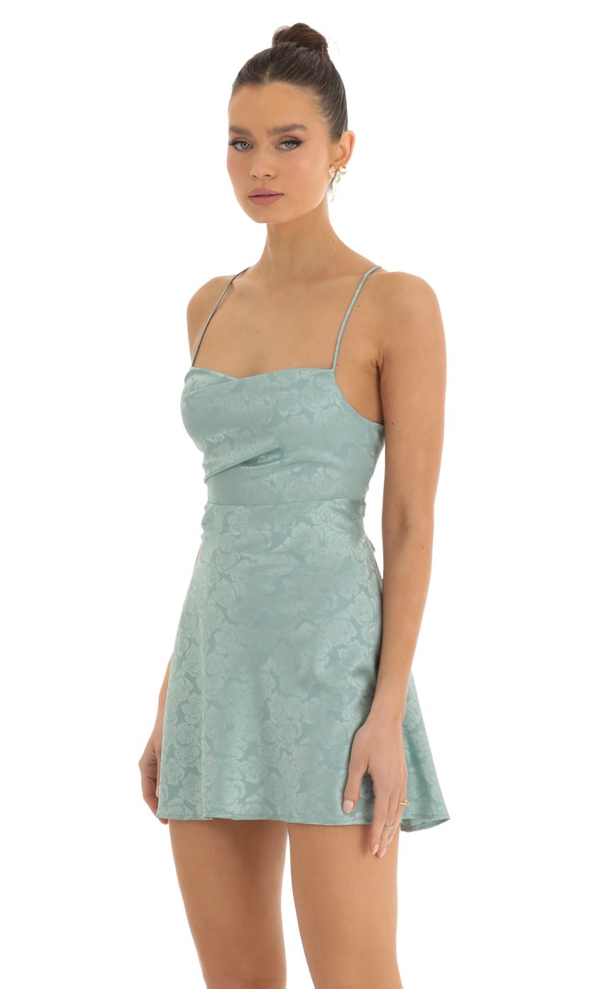 Picture Floral Jacquard A-Line Dress in Teal. Source: https://media-img.lucyinthesky.com/data/Jan23/850xAUTO/a8c50bee-33a2-40fc-baf0-8e3e2d0702c1.jpg