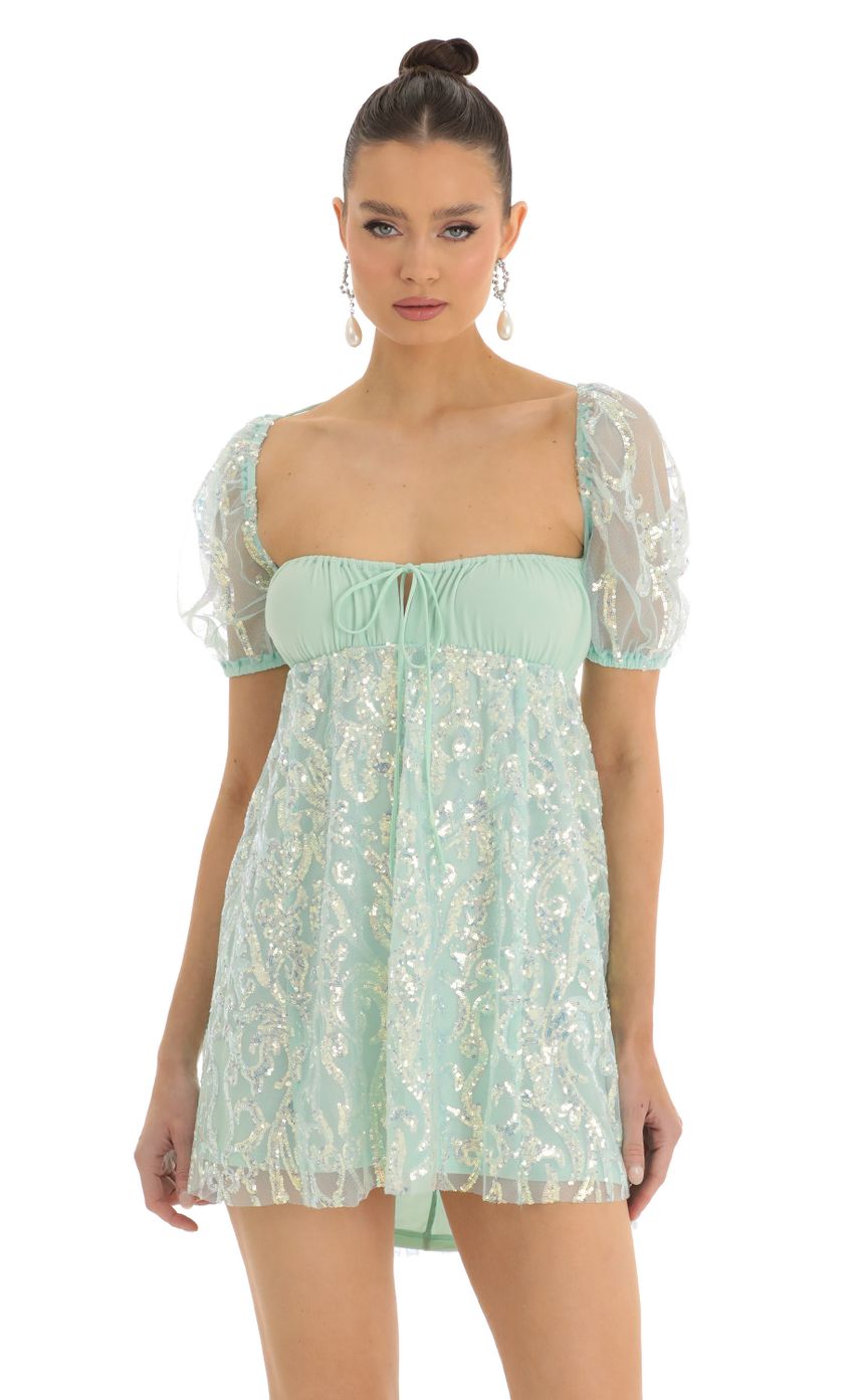 Picture Tajari Sequin Puff Sleve Baby Doll Dress in Mint Green. Source: https://media-img.lucyinthesky.com/data/Jan23/850xAUTO/aab26e69-0c55-4a71-a3cf-e96915d1b705.jpg