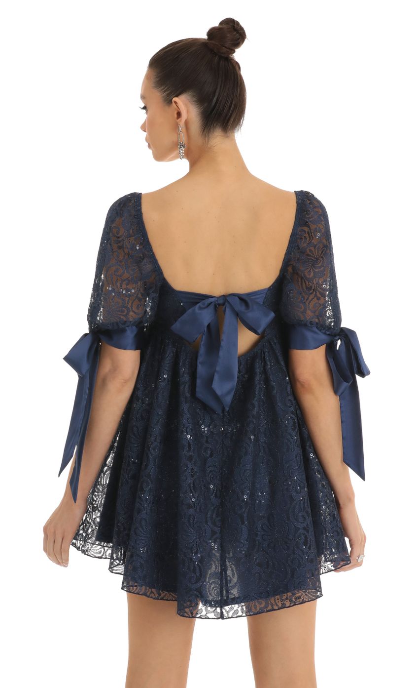 Picture Sequin Lace Baby Doll Dress in Dark Blue. Source: https://media-img.lucyinthesky.com/data/Jan23/850xAUTO/ad992490-efe5-4d33-8393-3a14b4cfb3e3.jpg