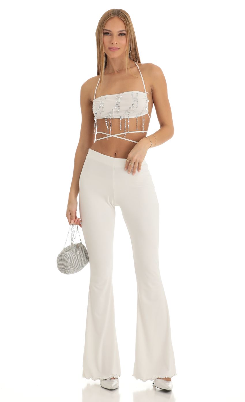 Picture Sequin Two Piece Pant Set in White. Source: https://media-img.lucyinthesky.com/data/Jan23/850xAUTO/b22cf944-ed28-4729-8f9f-952e731b244a.jpg