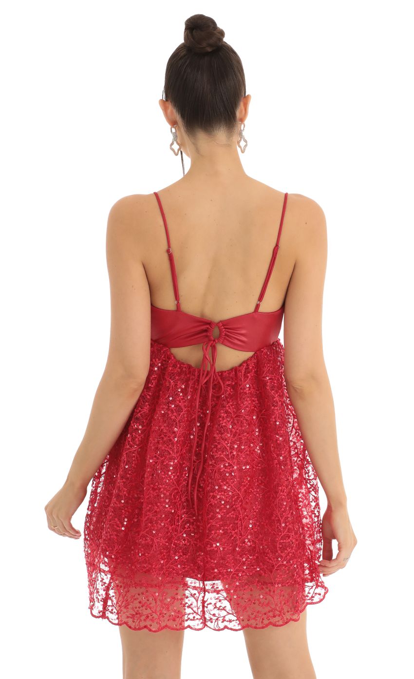 Picture Sequin Embroidered Baby Doll Dress in Red. Source: https://media-img.lucyinthesky.com/data/Jan23/850xAUTO/b4dcf67e-7313-46a0-8d8a-b3fbb94204e2.jpg