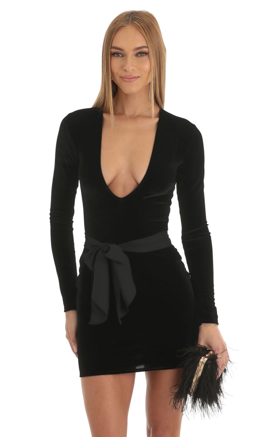 Picture Velvet V-Neck Dress in Black. Source: https://media-img.lucyinthesky.com/data/Jan23/850xAUTO/b5587982-d256-4c42-ba08-1b600386ab59.jpg