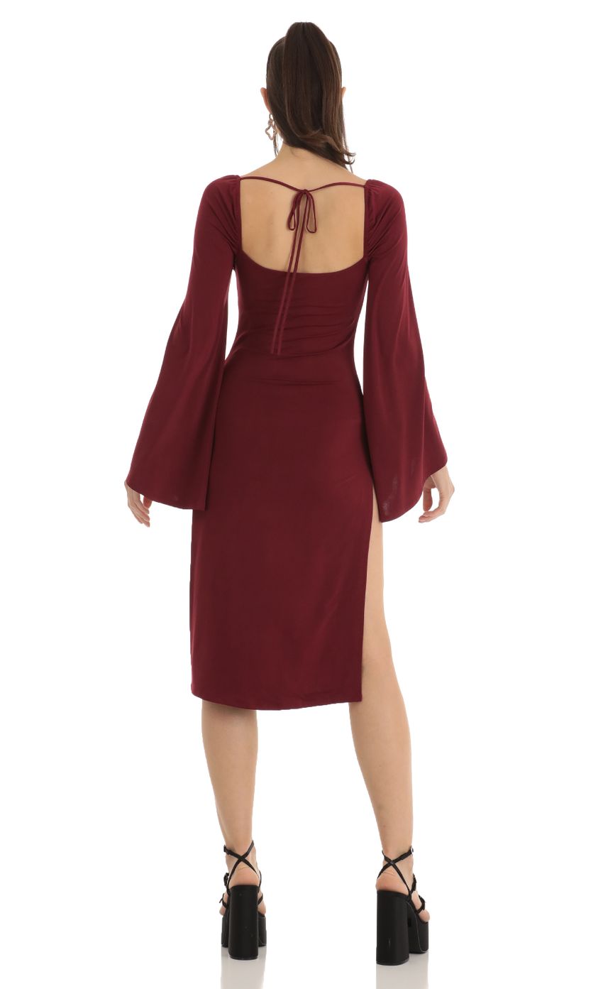 Picture Flare Sleeve Midi Dress in Red. Source: https://media-img.lucyinthesky.com/data/Jan23/850xAUTO/b6df818f-5c90-439a-a810-72f0c39872e6.jpg