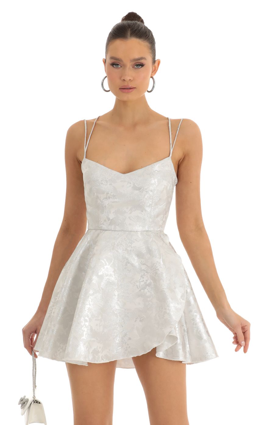 Picture Glitter Jacquard Cross Back Dress in Silver. Source: https://media-img.lucyinthesky.com/data/Jan23/850xAUTO/b6ea0e3a-b938-40df-8fc1-11726f2d574e.jpg