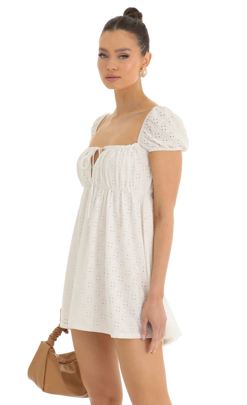 Picture Baby Doll Dress in White. Source: https://media-img.lucyinthesky.com/data/Jan23/850xAUTO/bf170ec2-4dcf-4c61-9991-3a4e9bfe5b73.jpg