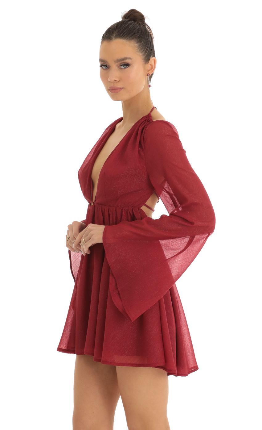 Picture Chiffon Plunge Neck Dress in Red. Source: https://media-img.lucyinthesky.com/data/Jan23/850xAUTO/ca0d9573-8966-4ac5-aa19-9e18df682eb1.jpg