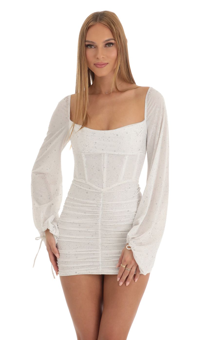 Picture Glitter Long Sleeve Corset Dress in White. Source: https://media-img.lucyinthesky.com/data/Jan23/850xAUTO/cf72d884-47c6-435c-82fb-dc10c2fea5dd.jpg