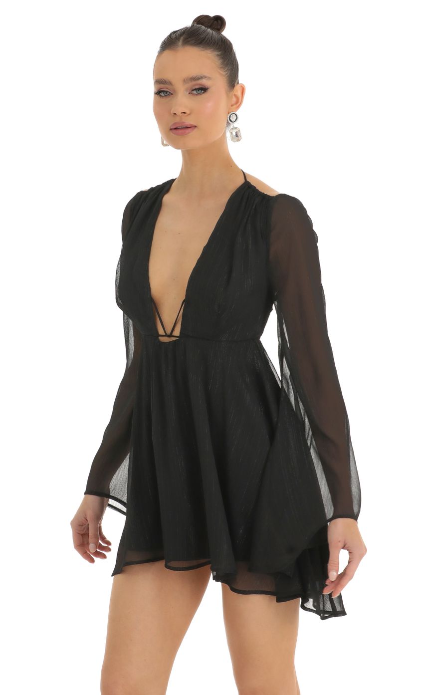 Picture Chiffon Plunge Neck Dress in Black. Source: https://media-img.lucyinthesky.com/data/Jan23/850xAUTO/d6801654-0cba-41b3-a459-8c587b398a73.jpg