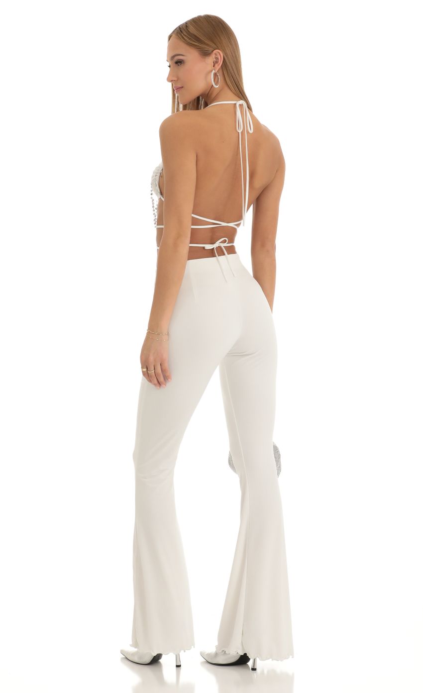 Picture Sequin Two Piece Pant Set in White. Source: https://media-img.lucyinthesky.com/data/Jan23/850xAUTO/d6d4da07-af52-45d5-9fe0-cbbd0772c178.jpg