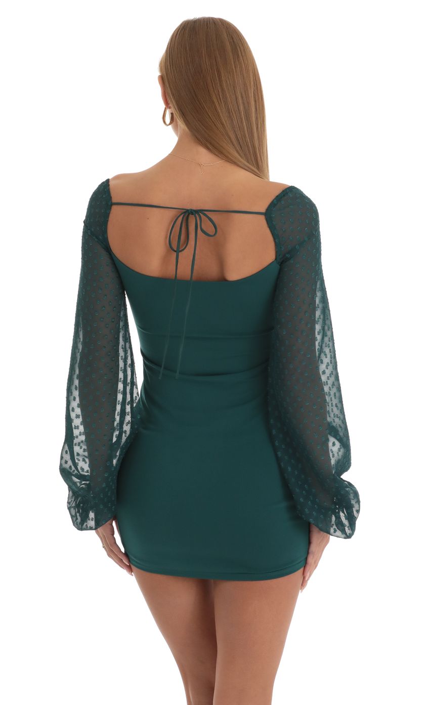 Picture Dotted Long Sleeve Dress in Dark Green. Source: https://media-img.lucyinthesky.com/data/Jan23/850xAUTO/da8f40a7-1a5c-4621-9aee-788ebe32a225.jpg