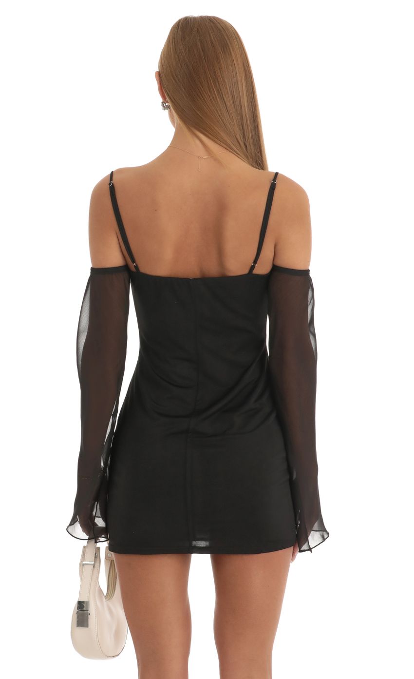 Picture Off Shoulder Cowl Neck Dress in Black. Source: https://media-img.lucyinthesky.com/data/Jan23/850xAUTO/e2285b55-bf8d-435b-b4c9-0ac9db7c1024.jpg